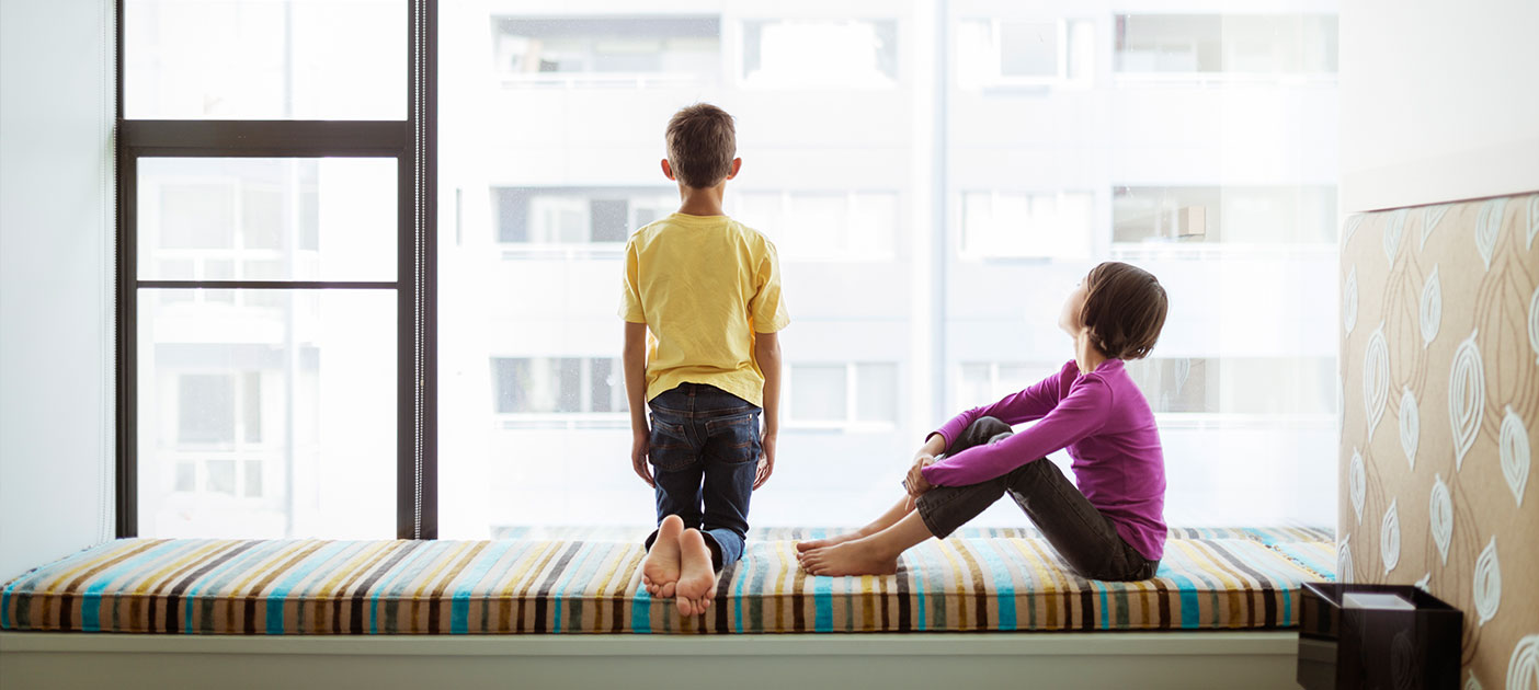 Children looking at of a HDB flat
