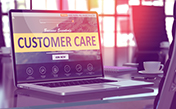 laptop with customer care text on screen