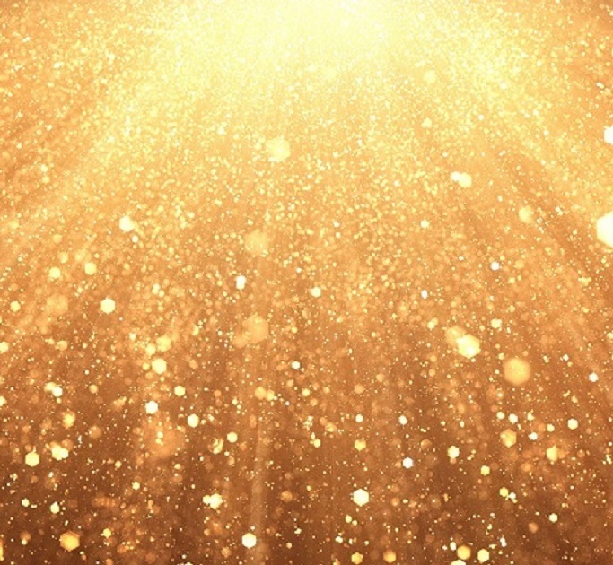 Golden sparkles in light