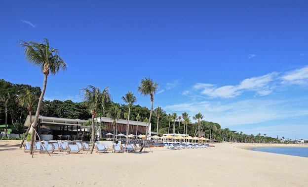 Lounge on daybeds while enjoying your breakfast at Tanjong Beach Club