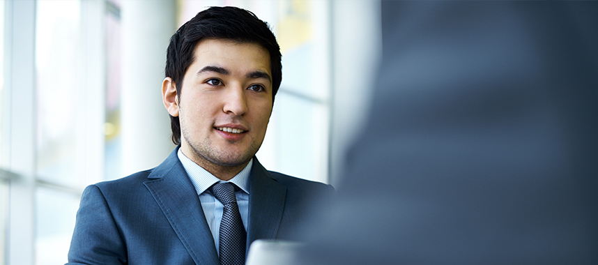 Well-dressed man going through a scholarship interview