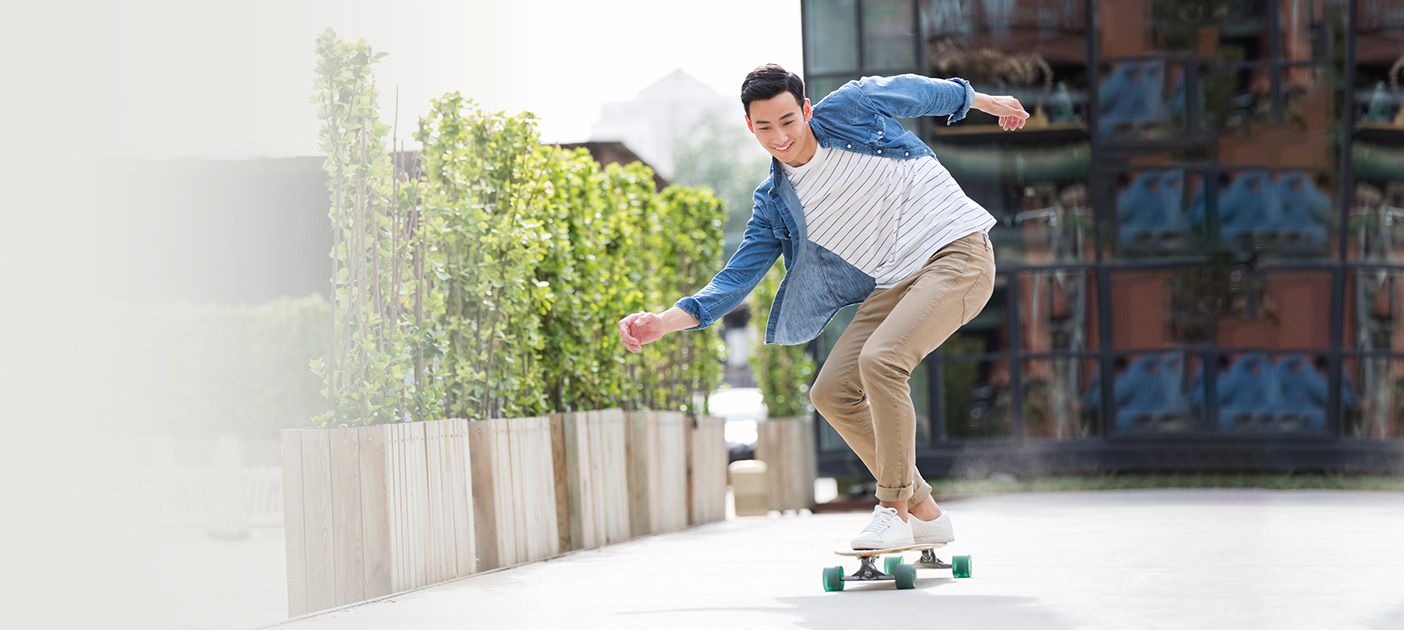 Young man on a skateboard, eager to earn more interest with very little effort