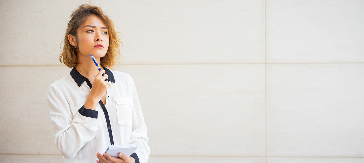 Woman thinking about what reference point to use to evaluate investment performance