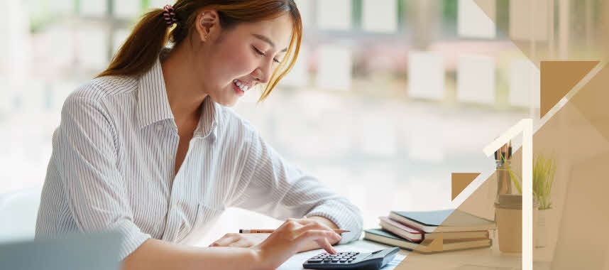 A woman looking at the key indicators of her financial health.