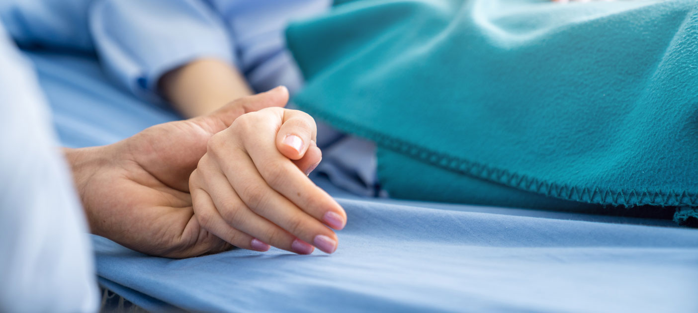 Doctors patients holding hands