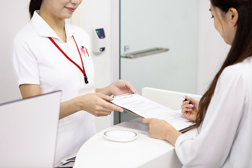 Patient paying at clinic