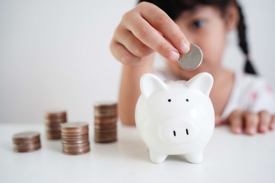 girl with coin bank